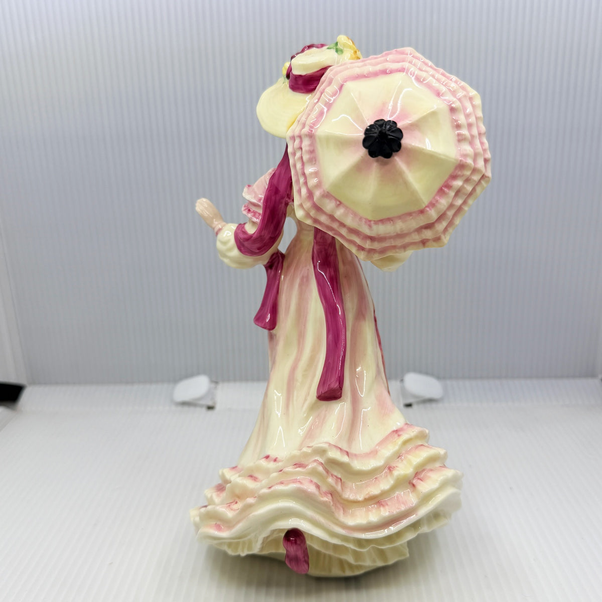 Royal Doulton figurine Springtime HN3477 by Valerie Annand, an 8 inch hand-painted bone china lady figure from the Seasons series