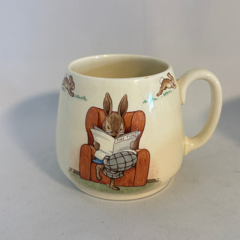 Reading the Times/Cycling Don Mug Royal Doulton Bunnykins