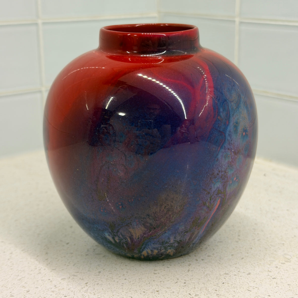 Royal Doulton Flambé Sung vase, red shoulder with violet and blue mottled body, side view