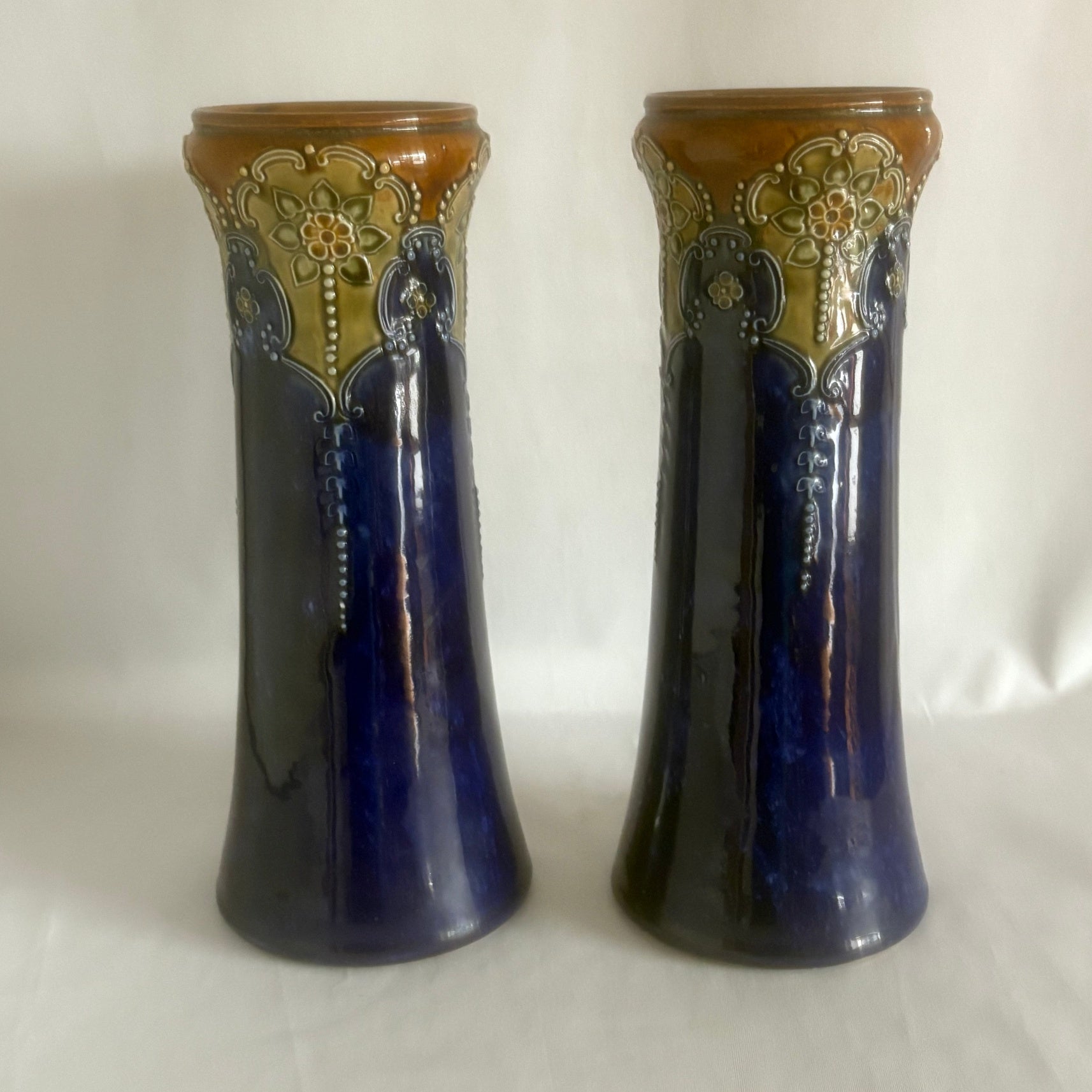 A Pair of Royal Doulton Lambeth Vases