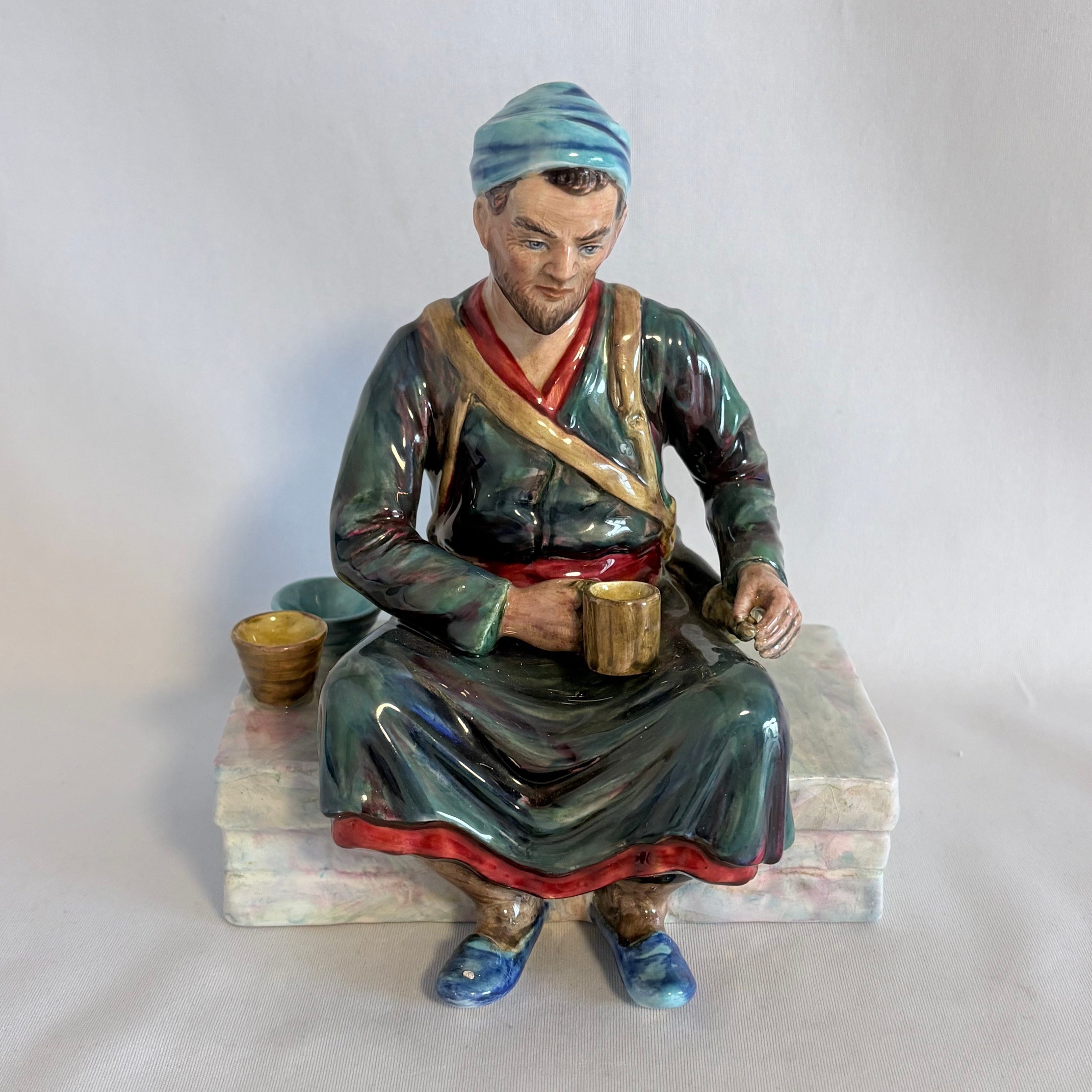 A Reg Johnson Figurine- Egyptian Water Carrier - William Cross